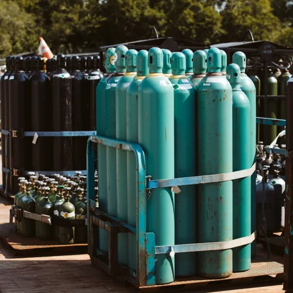 Cylinders on pallet in yard 